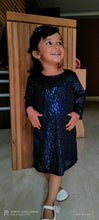 Load image into Gallery viewer, Girl wearing 3/4th sleeves knee length navy sequence party frock with white shoes
